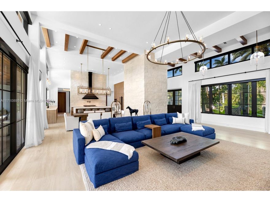 Elevate your lifestyle in this brand-new estate completed in 2024, on prestigious La Gorce Island. This architectural masterpiece features 15 ft ceilings, abundant natural light, 5 bedrooms, 5/1 bathrooms & 4,288 SF of living area and offers a seamless flow from the indoors to the outdoor living areas. The gourmet kitchen is an epicurean dream, featuring porcelain countertops, Italkraft cabinetry, and top-of-the-line appliances. The primary suite includes a spacious walk-in closet and spa-inspired bath with garden views. Landscaping by MAKwork creates an entertainer’s paradise featuring pool, spa, summer kitchen and two fireplaces. Additional features include a fully equipped gym, space for a car lift, and generator. Enjoy the perfect blend of privacy, elegance, and upscale functionality.