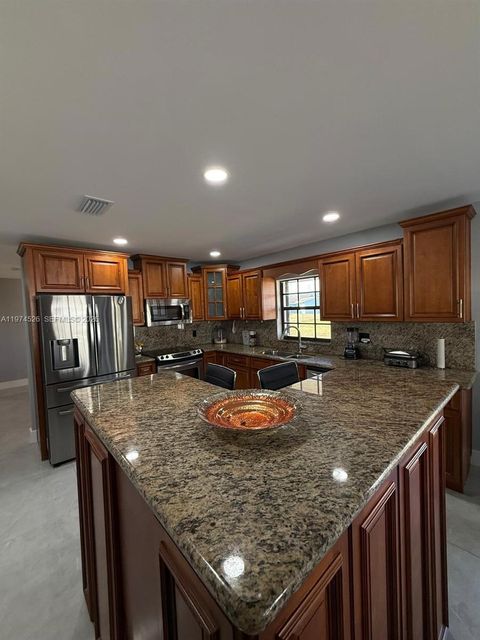 Photo of 1771 NW 191st St, Miami Gardens, FL 33056 (MLS # A11974526)