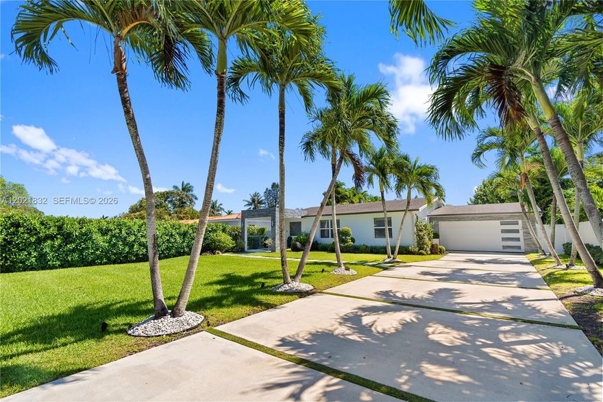 Experience a serene waterfront retreat where modern luxury meets Miami living. Set along the Biscayne Canal with ocean access, this fully gutted and rebuilt 3BD/2BA contemporary home offers 1,640 SF of refined comfort on a lush, fenced lot with an electric front gate. Inside, porcelain floors flow through an open layout with a sleek modern kitchen, updated bedrooms and baths, and a third bedroom with private access. Outdoors, enjoy a tranquil oasis with a new heated pool and jacuzzi, covered patio, gazebo, summer kitchen, solar-powered LED lighting, and beautiful water views from the patio and primary suite. With impact windows, security system, a newer 2020 roof, brand new plumbing and electrical installation, no HOA, and turnkey appeal, this rare waterfront property delivers privacy, elegance, and effortless indoor-outdoor living. Schedule your private tour today, and you will fall in love to it.
