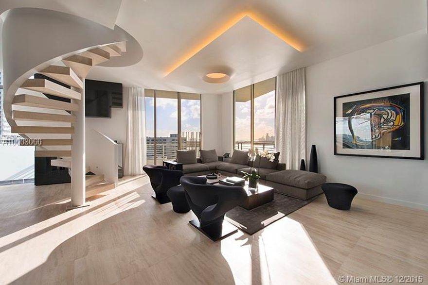 No expense was spared on this stunning penthouse at the exclusive Capri! With over 2,400 square feet of terrace, including a rooftop summer kitchen and impressive sail system, you'll be equipped for entertaining any sized gathering. This gorgeous home fea tures a spacious floor plan and fine finishings including glass-backed fireplace, large walk-in closets, and custom built-ins. Enjoy jaw-dropping views of Biscayne Bay, the downtown Miami skyline, South Beach and the Atlantic Ocean from every room.