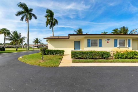 Photo of 2854 E Crosley Dr E #J, West Palm Beach, FL 33415 (MLS # A11923852)