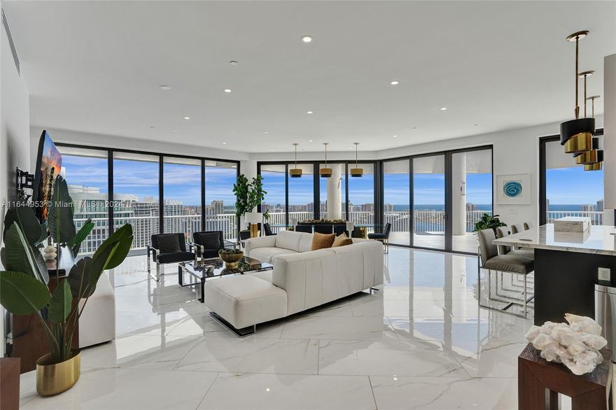 SPECTACULAR, FULLY REMODELED 2 STORY PENTHOUSE HOME OVERLOOKING THE INTRACOASTAL AND ATLANTIC OCEAN.  MESMERIZING SUNRISES WILL WELCOME EVERY DAY! THIS HOME FEATURES AN OPEN KITCHEN WITH TOP OF THE LINE APPLIANCES, WINE COOLER, PORCELAIN TILES & ELECTRIC SHADES THROUGHOUT, ENTERTAINMENT/LIVING ROOM & LARGE ROOFTOP TERRACE.  THE BEDROOMS ARE DOWNSTAIRS AND HAVE A SEPARATE ENTRANCE FROM THE LOWER LEVEL.  THE MASTER BEDROOM OFFERS HIS AND HERS BATHROOMS, 2 LARGE WALK IN CLOSETS.  ALL BEDROOMS HAVE EN-SUITE BATHROOMS.  THIS IS A MUST SEE UNIT!LIVE IN PRESTIGIOUS WILLIAMS ISLAND WITH FULL AMENITIES:  15 TENNIS COURTS, 4 PICKLE BALL COURTS, 3 RESTAURANTS, STATE OF THE ART SPA, MARINA, WALK/JOG PATH, KIDS PLAYGROUND, COURTESY BUS, WALK TO HOUSES OF WORSHIP AND SO MUCH MORE....
