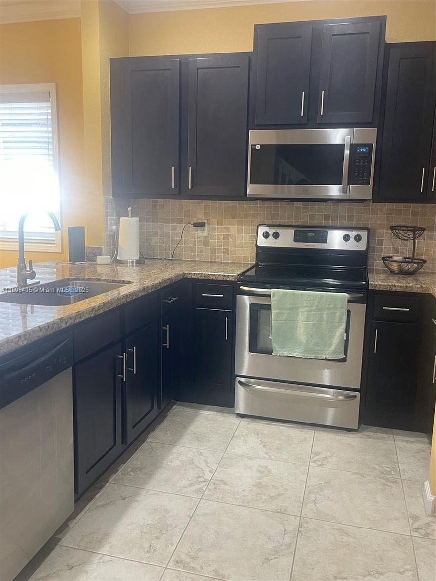 Beautiful and completely renovated 3 bedrooms, 2 1/2 bathrooms townhouse close to the beach. Large open kitchen, living room and dinning room. Modern cabinets with granite counter tops and stainless steel appliances. Half bathroom on the main level, one car garage and a very private enclosed patio that opens to lush garden. More parking space in front of the townhouse. Second floor has 3 large bedrooms. Master bedroom has a walking closet and beautiful attached bathroom. One more updated bathroom and large new washer/dryer in a closet. Community pool.Close to major highways and hospital but still quiet family neighborhood. 
Min credit required by HOA 650.