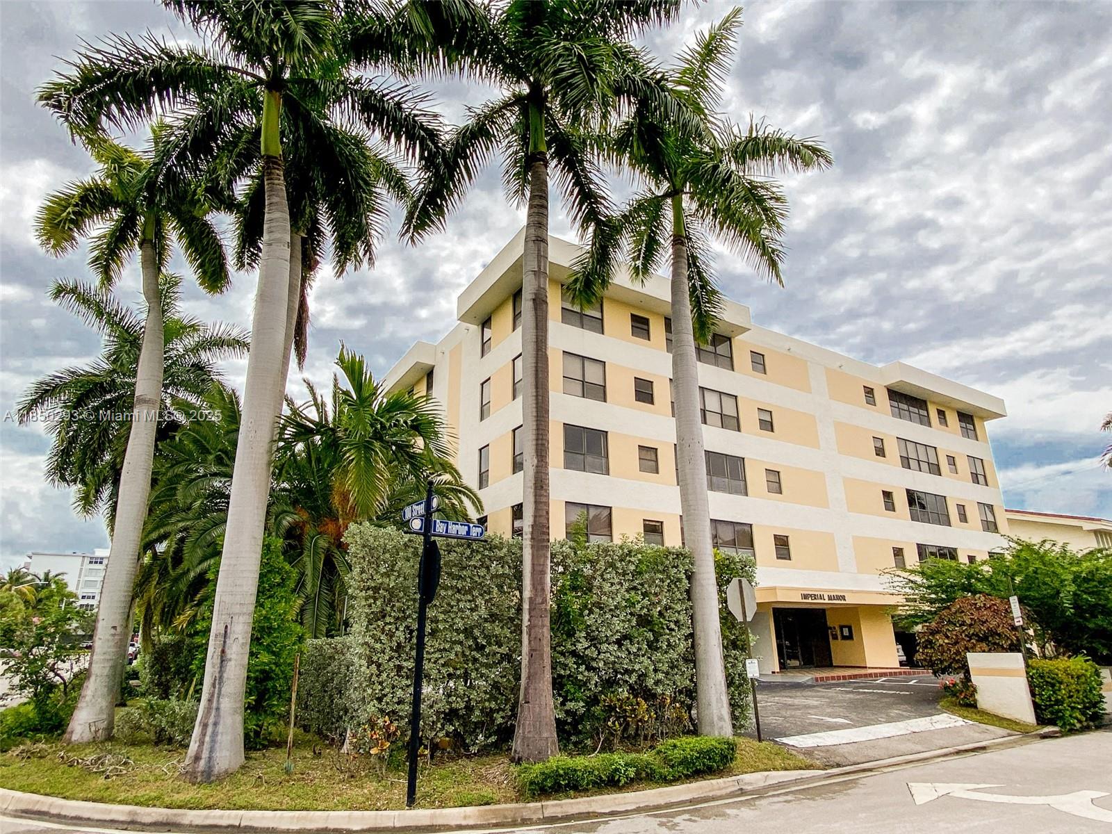 DESIRABLE BAY HARBOR ISLANDS. Bright Large 900 Sq. ft. 1 Bed 1 1/2 Bath. Upgraded kitchen and bathrooms. Master Bathroom with shower, guest bathroom. Tile and carpet, crown molding, eat-in kitchen. Washer/Dryer on the same floor. SW Corner unit. Only four units per floor. Covered parking space. Few minutes drive to the Beach, Bay Harbor, Bal Harbour and Surfside Shopping and Restaurants. Excellent schools. Centrally located between Miami and Fort Lauderdale Airports