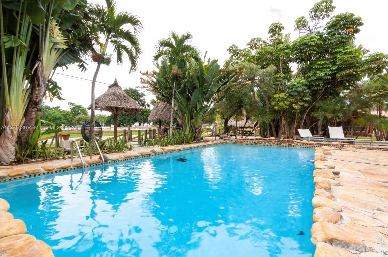 ANNUAL RENTAL - This is a true west Davie home built in the 1960s that still
holds its charm! It has the original wood frame exterior with fully upgraded modern interior finishes. It's perfectly suitable for large groups looking to enjoy some quiet time away from busy cities. Near major highways, beaches, restaurants, parks & shopping malls. Enjoy a relaxing time laying out by the pool, take a lesson in Horseback riding, BBQ by the patio, or go explore the many sites & activities of South Florida!
PROPERTY DELIVERED UNFURNISHED