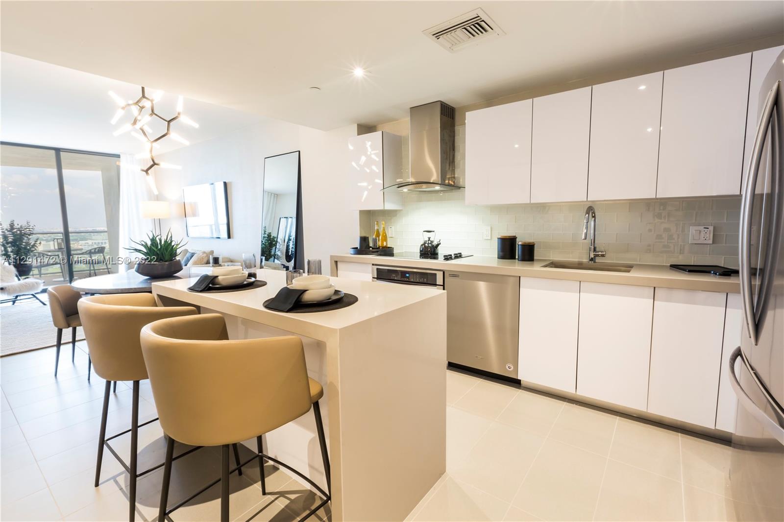 Stunning 1 bed 1.5 baths with a den 910 SQFT, UNIT IS FULLY DESIGNED AND FURNISHED. Building is approved with 3% down! All included in HOA, Incredible sunset views, huge balcony, great location, easy access on/off major highways. 30,000 square feet of amenities including 3 Pools, Jacuzzi, Sun Deck, 3,000 sqft gym, Spa, Sauna & Treatment Room, Racquetball Court, Theater, Social Room, Indoor/Outdoor 24/7 security, concierge, management on site, self parking, valet on site.