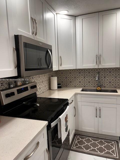 Welcome to this beautifully updated 2 bedroom, 2 bath half duplex with a 1 car garage, located in the heart of Coral Springs. This move in ready home offers the convenience of No HOA, giving you more flexibility and fewer restrictions. Open concept living area filled with natural light, and a modern kitchen equipped with stainless steel appliances. There’s also a family room in the back ideal for a home office, playroom, or extra living space.
The backyard features a shared inground pool, spacious paver patio, and grassy area perfect for entertaining or relaxing outdoors.
Conveniently located near top rated schools, parks, shopping, dining, and major roadways. A must see home in a desirable location!