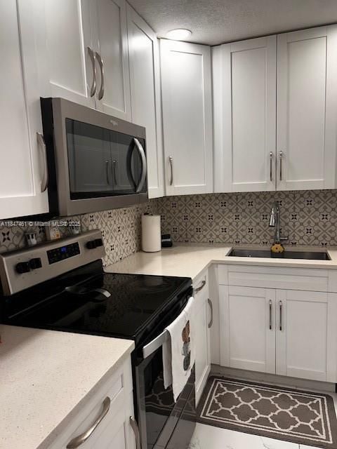 Photo of 4010 Coral Springs Dr, Coral Springs, FL 33065 (MLS # A11847461)
