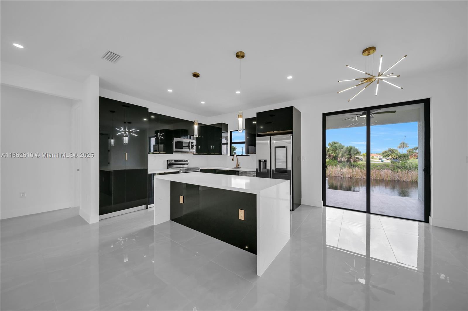 Brand-new modern home with stunning river views! This thoughtfully designed residence features 3 spacious bedrooms plus a flexible den—perfect as a 4th bedroom, office, or den. Enjoy the safety of a fenced pool, ideal for family fun and relaxing outdoor gatherings. The open-concept floor plan shines with a gourmet kitchen equipped with top-tier appliances, sleek cabinetry, and elegant countertops, flowing seamlessly into bright living and dining spaces. Two beautifully finished bathrooms complete the home’s modern appeal. Whether you seek a serene retreat or vibrant waterfront living, this property provides endless possibilities. Act now—schedule your private tour today!