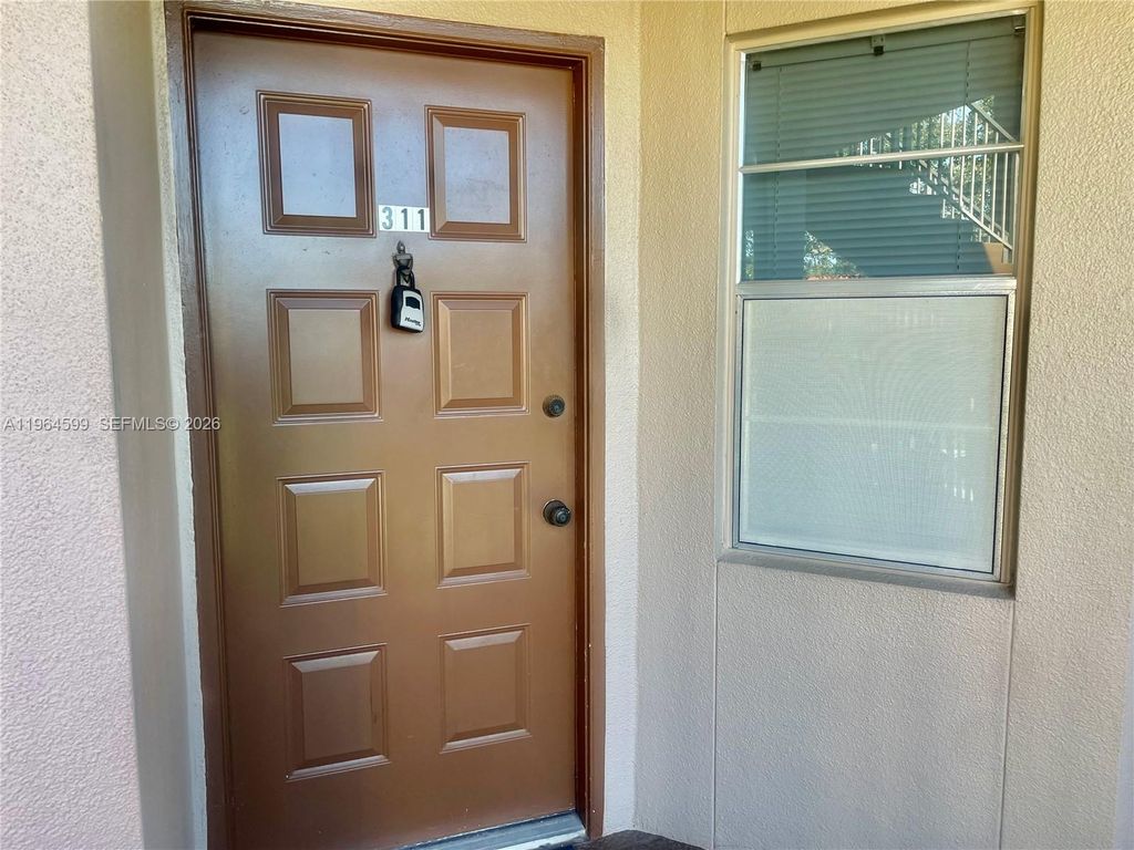 Photo of 1251 SW 125th Ave #311T, Pembroke Pines, FL 33027 (MLS # A11964599)