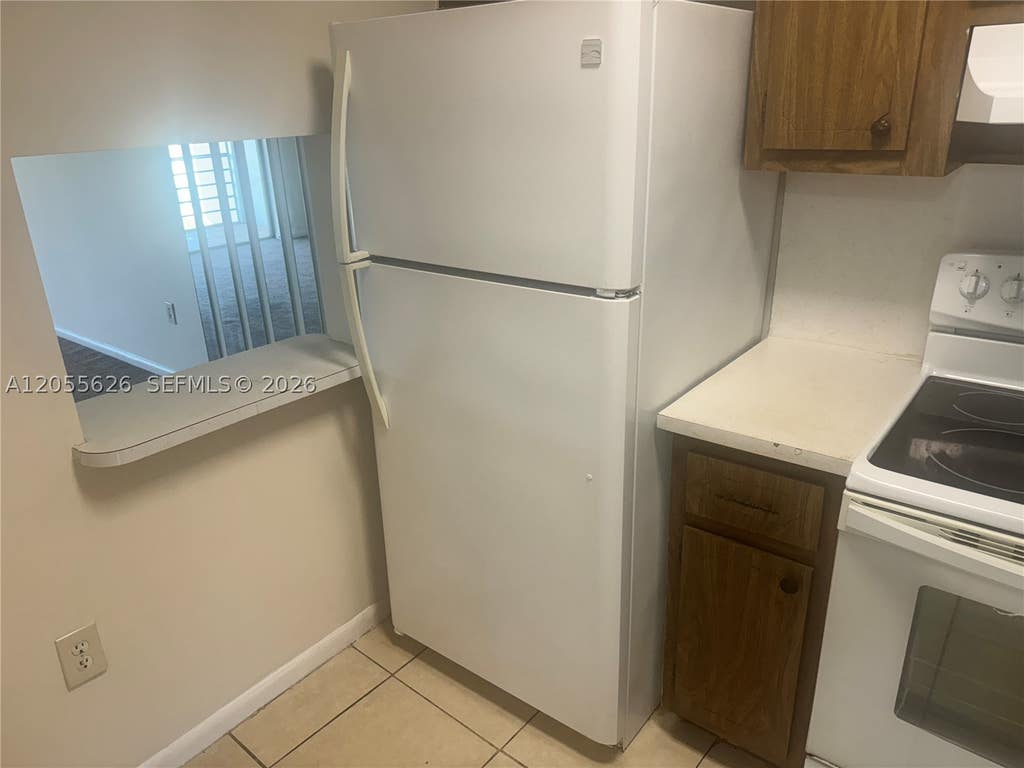 Photo of 8135 Sunrise Lakes Blvd #309, Sunrise, FL 33322 (MLS # A12055626)