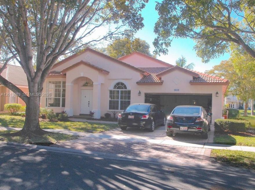 Beautiful totally upgraded 3 bedroom 2 bath lakefront home in West Pembroke Pines. Ceramic tile throughout, luxury vinyl flooring in bedrooms, split floor plan, upgraded kitchen with stainless steel appliances and granite countertops, both bathrooms totally redone, travertine tile in master bath, crown molding throughout entire house and new baseboards, luxury vinyl flooring in the bedrooms. This house is immaculate! Just bring your toothbrush!