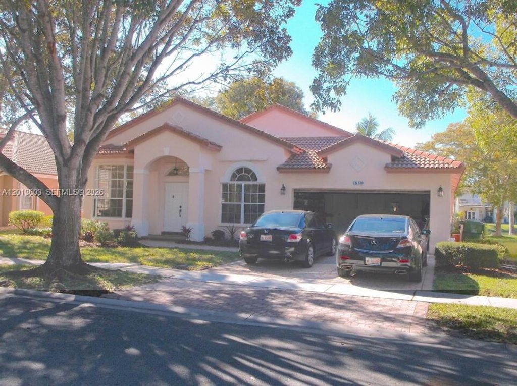 Photo of 18430 NW 11th St #1, Pembroke Pines, FL 33029 (MLS # A12013803)