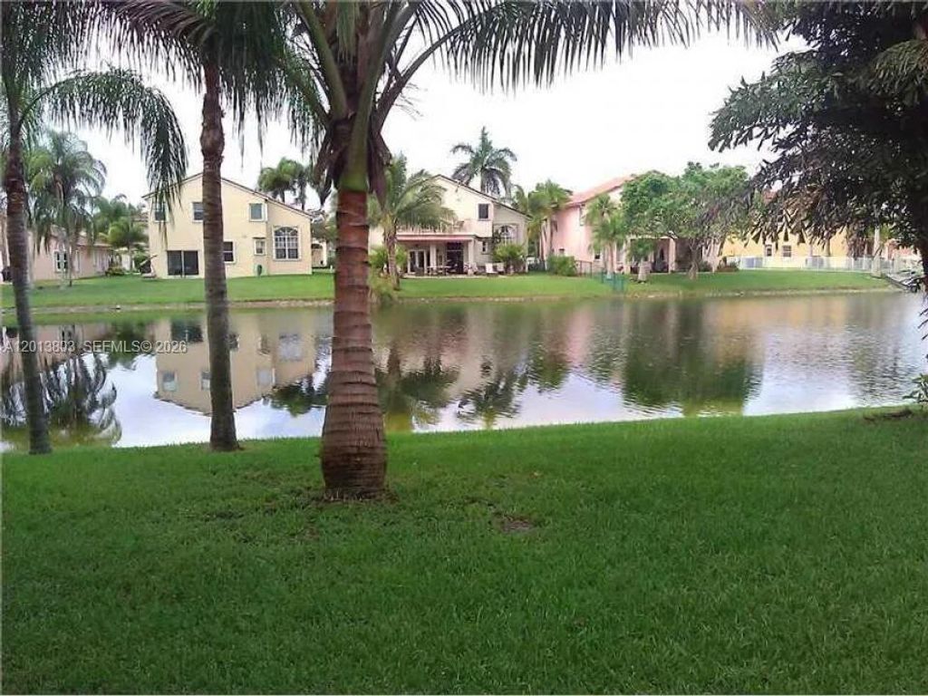 Photo of 18430 NW 11th St #1, Pembroke Pines, FL 33029 (MLS # A12013803)