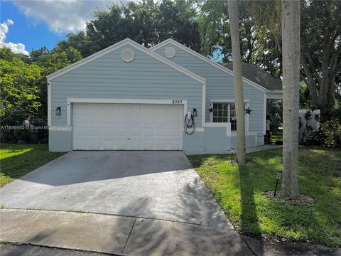 Photo of 8320 SW 12th St, Pembroke Pines, FL 33025 (MLS # A11886450)