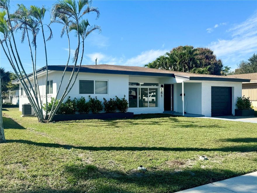 REDUCED TO BE PRICED TO SELL! IMPACT WINDOWS 2021, NEW ROOF 2025 in perfect shape, CENTRAL AC, Beautiful fully renovated 4/2 Single family in the wonderful Neighborhood of LAUDERHILL, FL 33311. This single family home is an AMAZING TOTAL 1,928 SQFT in (UNDER AIR 1,769 SQFT) on a clean Lot of 8,198 sqft. CERAMIC FLOORS (no carpet), + Amazing Brand New Kitchen with Stainless Steel Appliances and Washer and Dryer and  Water Heater in a fantastic convenient laundry room with exterior access. LARGE YARD for entertainment. FRESHLY PAINTED OUT AND INSIDE. CLEAR TITLE, NO LIENS, NO OPEN PERMITS, NO VIOLATIONS. VACANT ON LOCKBOX! Conveniently located, this home combines suburban tranquility with easy access to entertainment and dining. Showing Assist.
