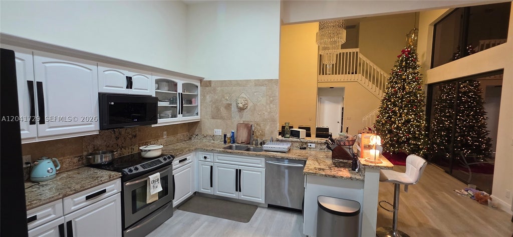 Photo of 5010 Perignon Way, Coral Springs, FL 33067 (MLS # A12041729)