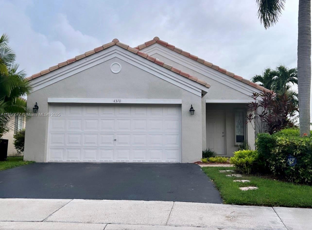 Amazing 3 bed/2 bath single home on a quiet Cul de Sac in the desired gated community of THE RIDGES. This is a bright one story home with lots of light from windows that have accordion hurricane shutters. There is neutral tile throughout. Stainless steel appliances in a cozy kitchen. You will be amazed with the oversized private backyard lot which is completely fenced, overlooking a lake through the neighbor's yard. The amenities include a community pool, splash pool for kids, tot lot, party room, basketball court, pickleball courts, beach volleyball and more. This property is zoned for excellent schools in Weston (Everglades Elementary, Falcon Cove Middle, and Cypress Bay High School. "door Ring" Excluded. Easy to show. Original roof (no leaks). Ok to lease.