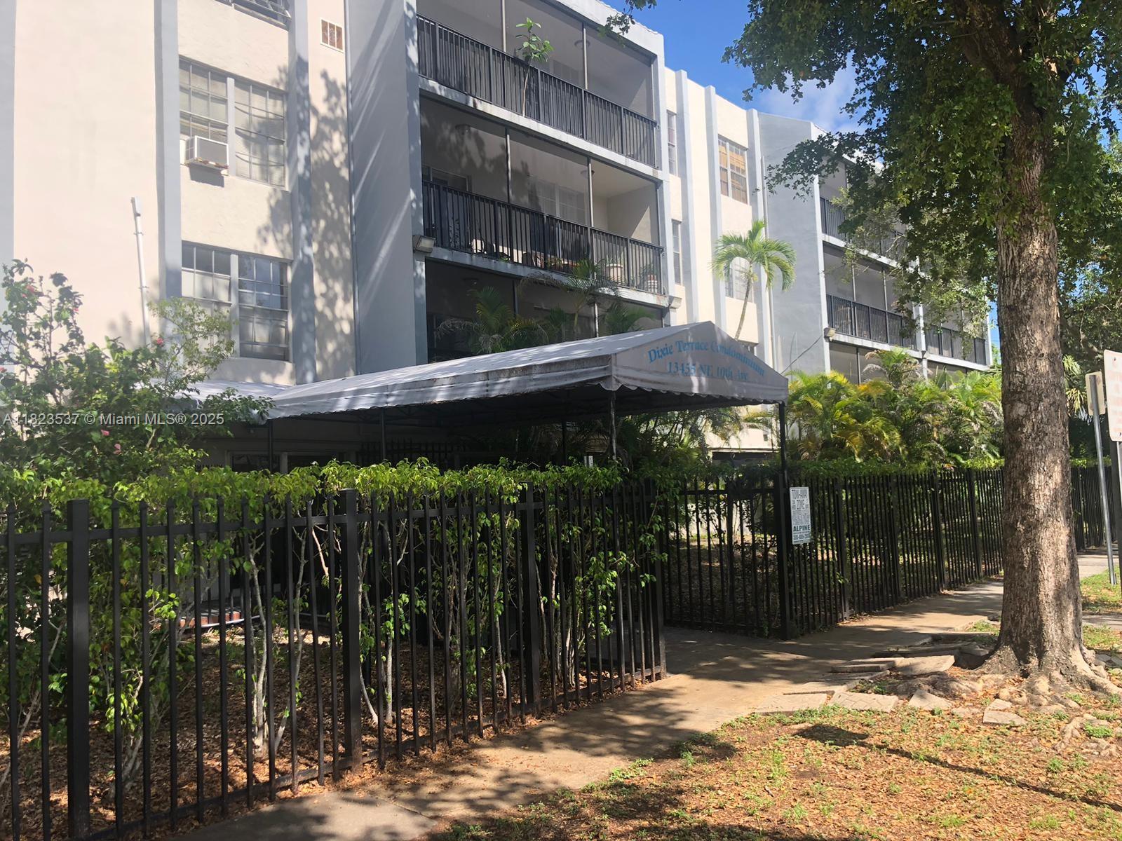 This charming 1-bedroom, 1-bathroom unit offers a perfect blend of comfort and convenience, ready for immediate occupancy. Step inside to discover beautiful wood floors that add warmth and elegance to the space. Enjoy year-round comfort with central air conditioning, ensuring a cool retreat during those warm Florida days. The property is nestled within a secure, fenced community, providing peace of mind and privacy. Plus, with covered parking included, you'll never have to worry about finding a spot. Don't miss the opportunity to make this delightful unit your new home!