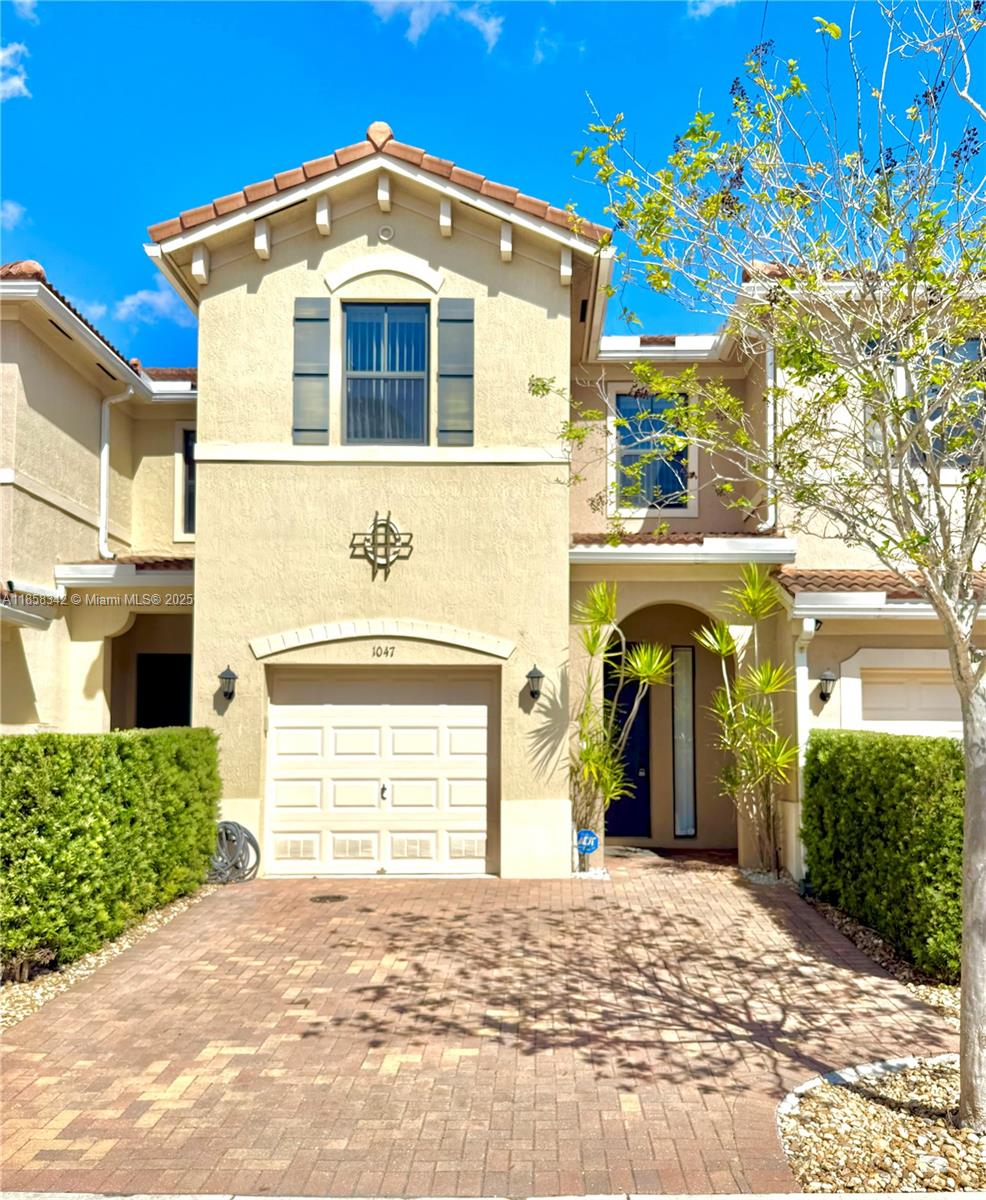 Updated 3-bedroom, 2.5-bathroom Lakefront townhome with COMPLETE IMPACT WINDOWS & IMPACT GARAGE DOOR in a gated community. Features include: Tile & waterproof/scratch-proof vinyl flooring, stainless steel appliances, Calacatta quartz kitchen counter tops, and a 1-car garage with driveway. Community Highlights include: Resort-style pool & Kids play area for little ones. Only 10 minutes to the beach, with quick access to Tri-Rail, I-95, and the Turnpike—perfect for easy commuting. Close to dining, shopping, and nightlife. Pet-friendly, Low HOA – just $158/month, FHA & VA financing welcome. For showings we are available to meet clients in person.
