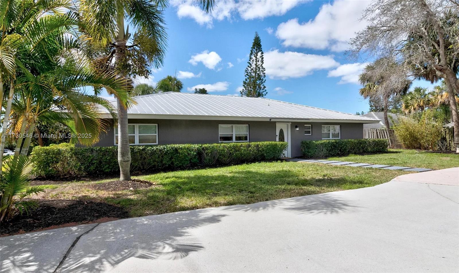 Very unique opportunity to acquire a home with 4 bedrooms 2 bathrooms- garage converted to the 4th bedroom. In addition, this home offers an extra room that can be used as 5th bedroom, office, kids play room, den, etc. This home sits on 1/3 of an acre and features a large enclosed courtyard area made perfect for outdoor eating and cooking, entertaining and many other activities. In addition, this home has updated kitchen with stainless steal appliances, granite counters, updated cabinetry and custom carpentry finishes. Lots of natural light throughout the home and its spacious open layout dining and living room areas. RV, boats, other large vehicles and more are welcome. No HOA. Low risk flood zone. Located a short drive to retail, shops, restaurants, beaches and more.