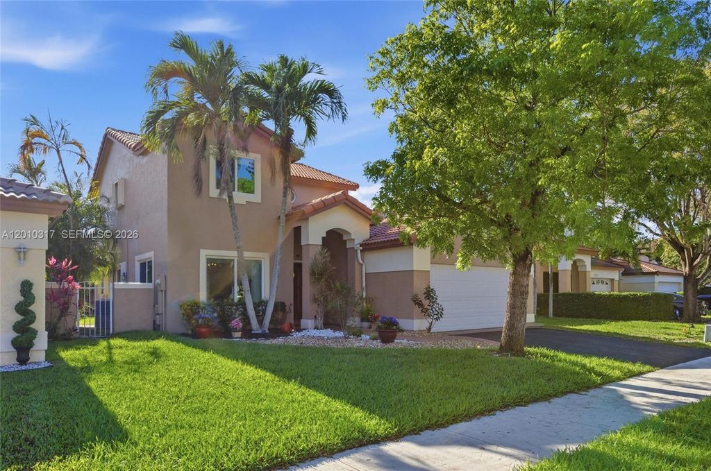 Photo of 5531 NW 50th Way, Coconut Creek, FL 33073 (MLS # A12010317)