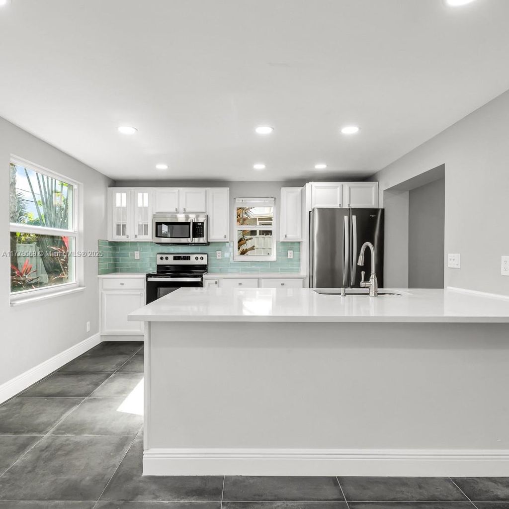 Photo of 668 NW 16th Ave, Boca Raton, FL 33486 (MLS # A11778069)