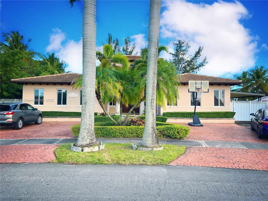 Beautiful Mediterranean style home rebuilt completely in 2005 with permits that has 4 Bedrooms, 3 Bathrooms, 3,199 sf livable area located on a 16,498 sf lot that backs up to a canal.  The canal allows motorized jet skis/boats and leads out to the Snapper Creek Waterway. This Westchester home is EXCELLENT for an established family or one that is starting and/or expanding.  The home has a Maid's Quarters with an Ensuite Bathroom and an eating area with its' own private entrance on the left side.  The flooring consists of Saturnia Marble all throughout.  The home also affords Impact Windows all throughout and the Flat Tile Roof is 3 years old.  The Kitchen has wood cabinetry, granite countertops, an island and stainless steel appliances.  The Dishwasher is not operational.  Don't miss out!!!