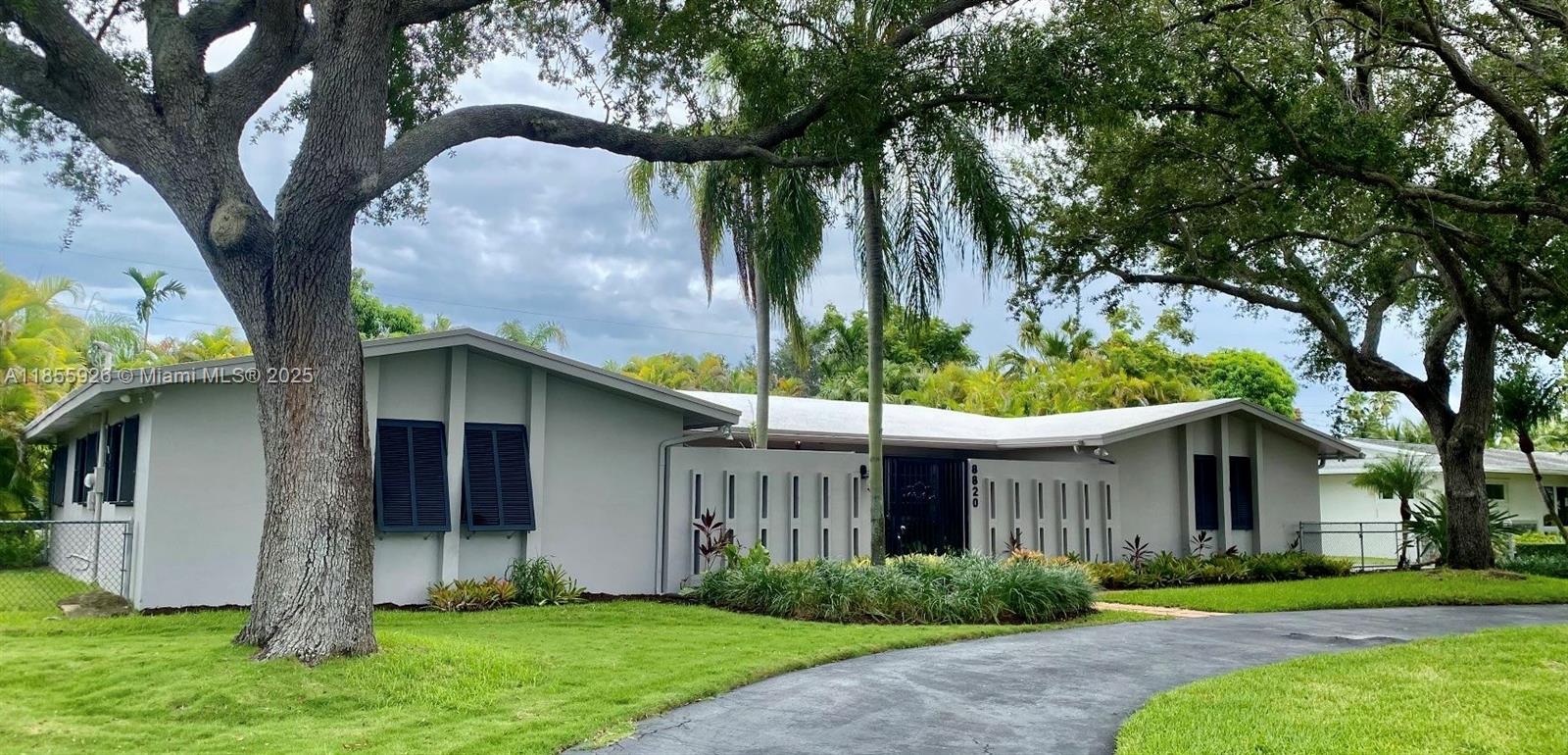 SUPER SPACIOUS 4 BED/2 BATH HOME WITH TRUE FLORIDA FEEL. TOTAL 3,348 SQ. FEET. OVERSIZED LOT (16,200 SQ. FEET). GREAT OUTDOORS WITH SCREENED POOL/DECK AND HUGE COVERED PATIO --- GREAT FOR ENTERTAINING & FAMILY GATHERINGS. FULLY FENCED YARD. OVER-SIZED 2 CAR GARAGE WITH STORAGE LOFT & LAUNDRY AREA. PRIME LOCATION IN CLOSE PROXIMITY TO EXCELLENT PUBLIC SCHOOLS. WALKING DISTANCE TO GOOD SHOPPING & DINING FACILITIES & CORAL REEF PARK.