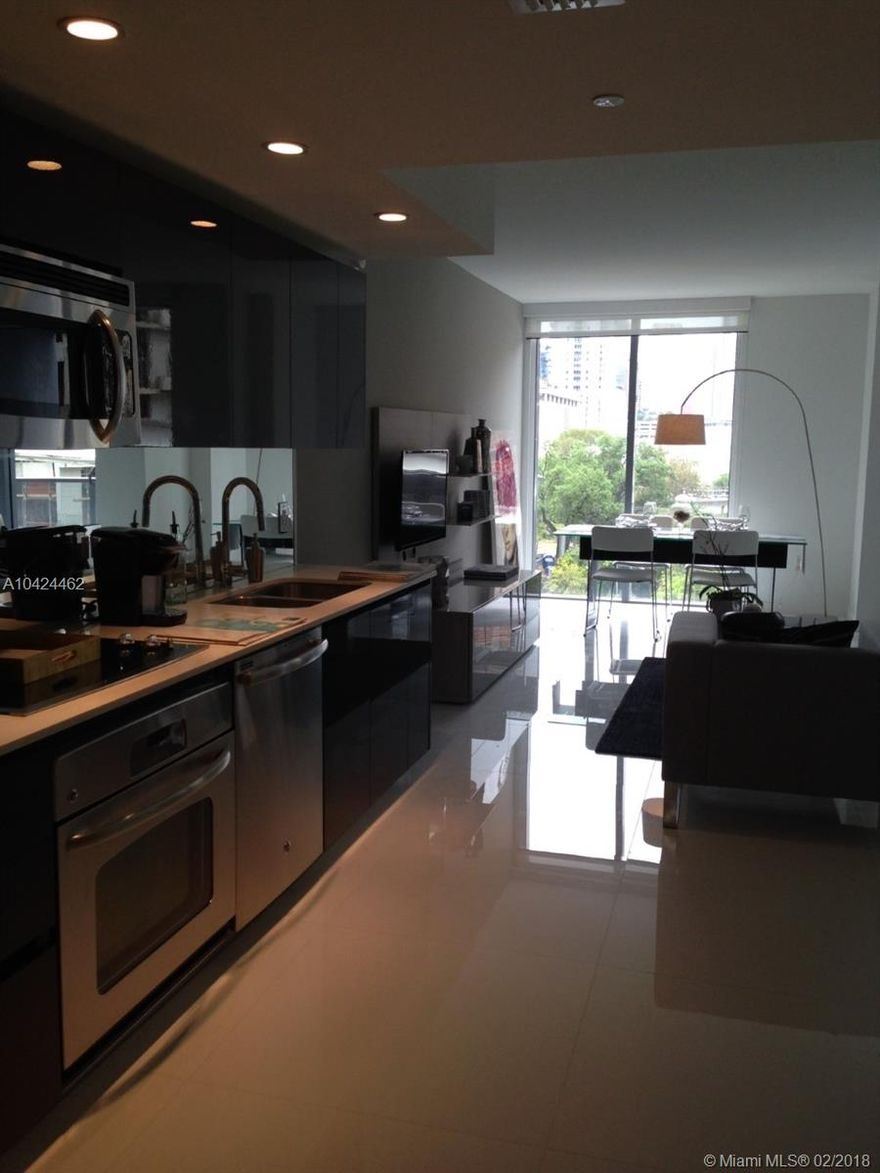 Great building designed by Karim Rashid. Unit fully furnished by Baltus. White quartz floor throughout unit. excellent location, walking distance to Mary Brickell Village, whole foods, nightlife, metro mover. Great amenities in a fun and young building, 24 hour doorman. Unit does not offer a parking space.