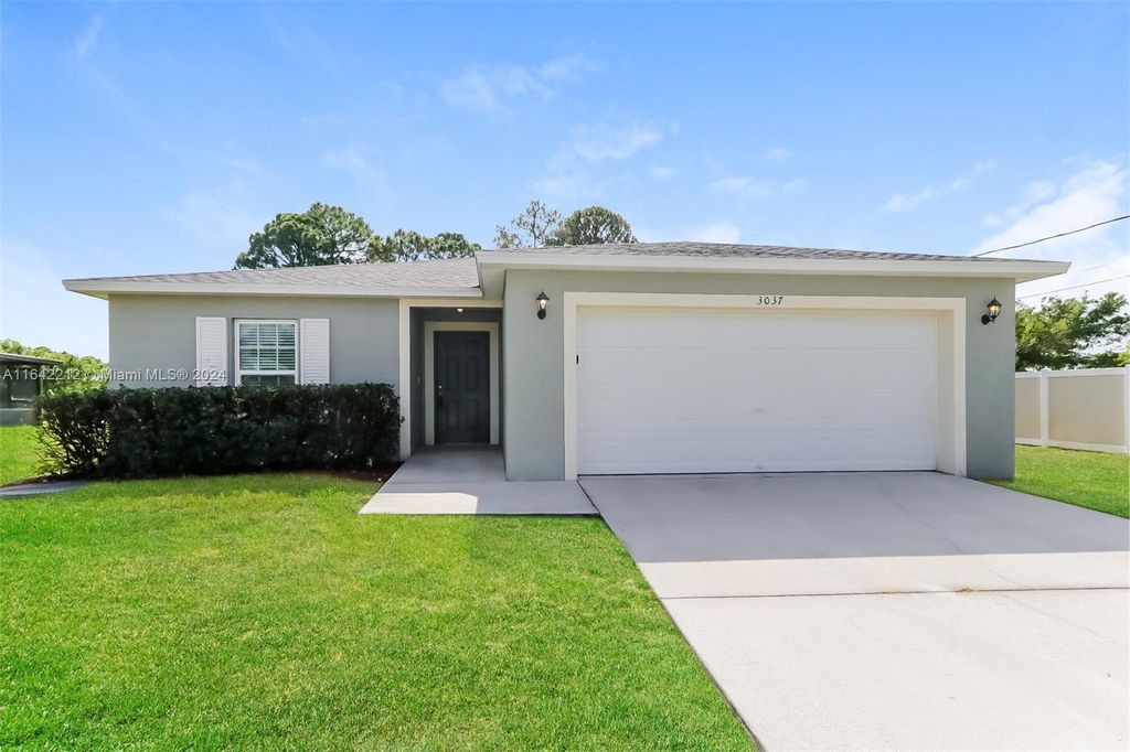 Photo of 3037 SW Ann Arbor Rd, Port Saint Lucie, FL 34953 (MLS # A11642212)