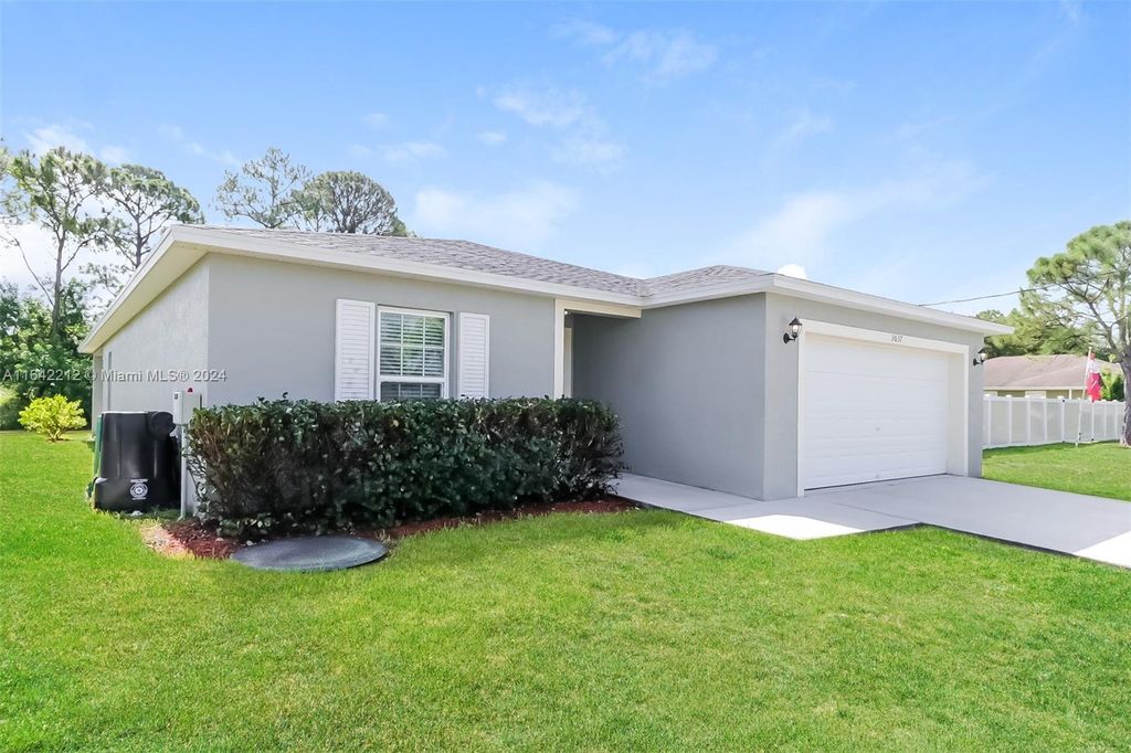 Photo of 3037 SW Ann Arbor Rd, Port Saint Lucie, FL 34953 (MLS # A11642212)