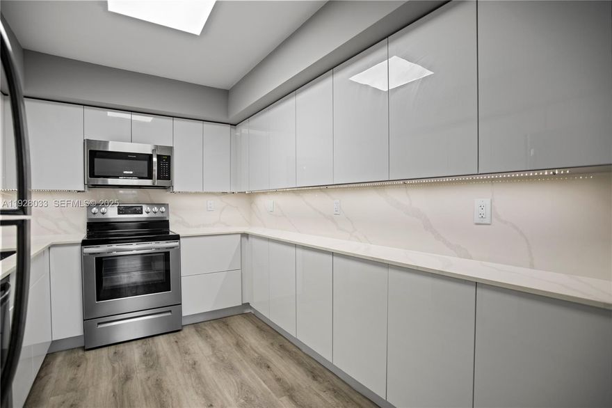 Remodeled first-floor condo in a beautiful All-Ages community featuring impact windows throughout. This spacious unit offers a modern and large kitchen with abundant high-end cabinetry, sleek quartz countertops, and new appliances. Both bathrooms have been tastefully upgraded with designer finishes, tankless toilets, and modern lighting. Additional highlights include Hunter Douglas window treatments, updated plumbing, and upgraded electrical throughout. The community is thoughtfully designed in a square layout and uniquely bordered by two canals, providing privacy, scenic water views, mature trees, and a variety of birds—creating a peaceful, nature-inspired setting. Ideally positioned, you’ll enjoy close access to the sports center, beautiful pool, clubhouse, basketball, soccer, tennis courts, barbecue areas, and scenic walking paths. With Cypress Creek just behind the neighborhood, it’s a welcoming blend of nature and convenience.  The location is exceptional—directly across from The Lakeside Shopping Plaza with Walmart, Marshalls, and popular restaurants, minutes to the Turnpike, 441, hospitals, and only 12 minutes to the Pompano Beach Pier for oceanfront dining, hotels, and entertainment. Financing & Association: Purchase with as little as 5% down. The community has reserves and strong insurance. COA requires 3 months escrow upon approval. DTI below 40% and minimum credit score 650. 2 pets (under 35 lbs.) allowed. No special assessments. Newly paved parking is coming soon.