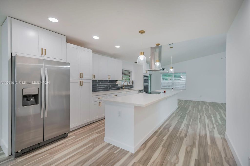 Photo of 6955 NW 18th St #6955, Margate, FL 33063 (MLS # A11591013)