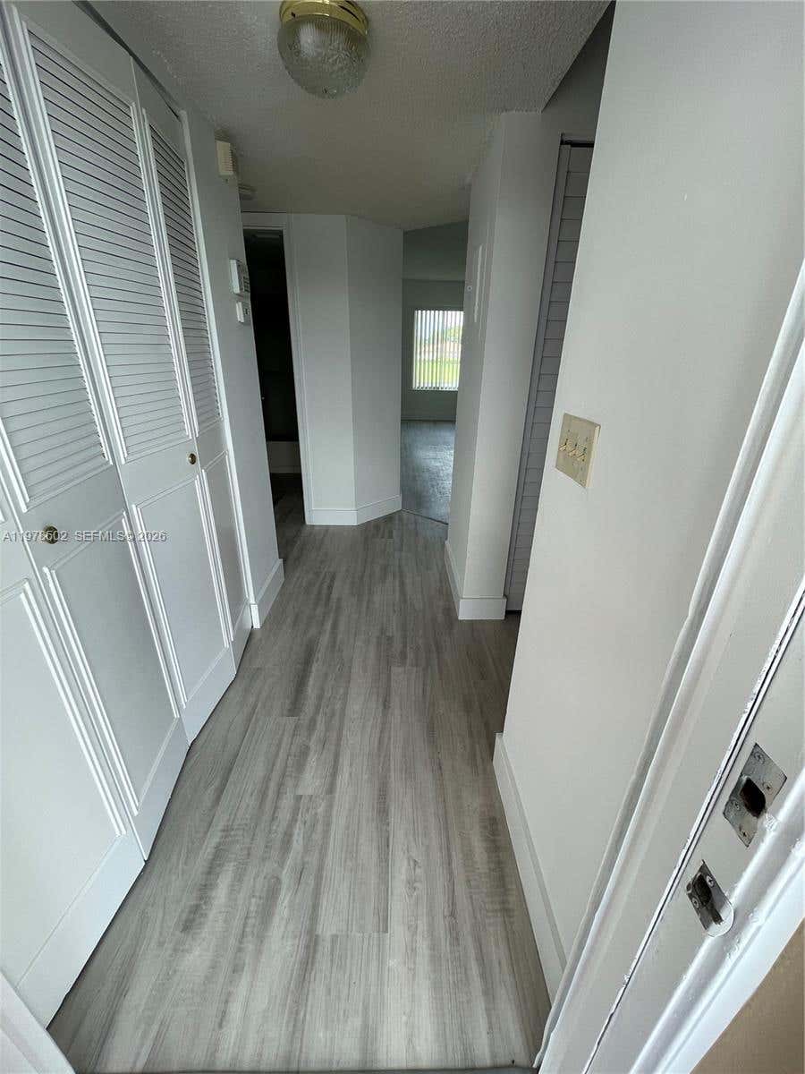 Photo of 918 Twin Lakes Dr #8-M, Coral Springs, FL 33071 (MLS # A11978502)