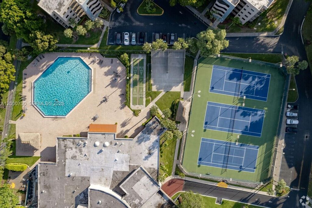 Photo of 900 Colony Point Cir #317, Pembroke Pines, FL 33026 (MLS # A12000730)