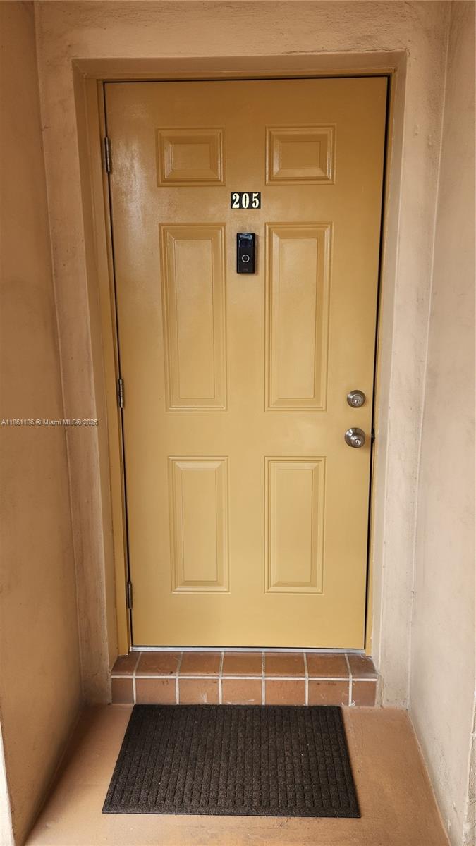 1/1.5 corner unit in Plantation Terrace, a 55+ community. This unit has been completely remodeled. It features hurricane impact windows and doors, crown molding, upgraded baseboards and premium luxury 100% waterproof vinyl flooring. The kitchen has new electrical panel, new a/c, hot water heater, S/S appliances, extra cabinet space and beautiful quartz counter-tops. Living Room has high hats, zebra blinds and so much more. Best of all this unit comes with extra storage room and undercover parking. Visit www.plantationterrace.com for prospective buyer application and other information.