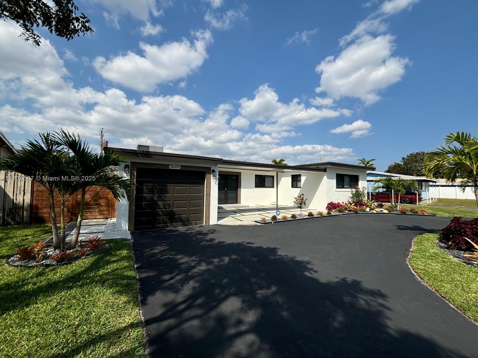 Stunning fully renovated 5-bedroom, 3-bath single-family home with sleek finishes and a modern open layout! Features a gourmet kitchen with white shaker cabinets, quartz countertops, and stainless steel appliances. Enjoy a designer backyard with a sparkling pool, stylish pavers, and pergola—ideal for entertaining. This move-in ready gem offers both comfort and style in a prime location with no HOA!