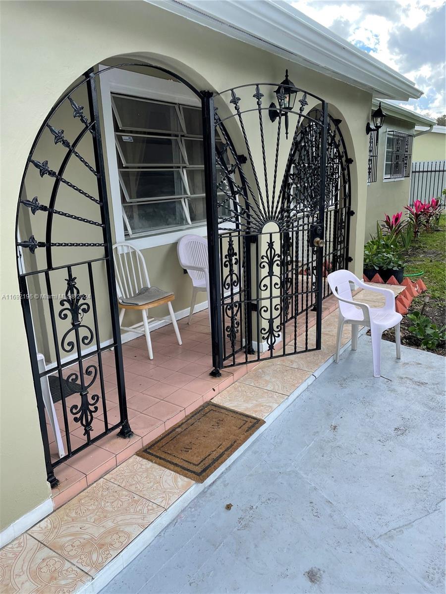 Beautiful Single Family Home located in a peaceful neighborhood in North Miami near major highways. Charming home boasts 3 bedrooms, 2 bathrooms, a 1 car garage, and a bonus room that can be used as a 4th bedroom, office, or den at the new owner's discretion. Large gated front yard with additional parking spaces, in a Cul De Sac, front porch, and Mango Tree. Upgraded kitchen with granite countertops and stainless steel appliances. A one-car garage was being used as a rental with a side entrance for additional income, but it can easily be used as a garage. Large backyard with mango and banana trees, patio, and pool space. This home is priced to sell and won't last.