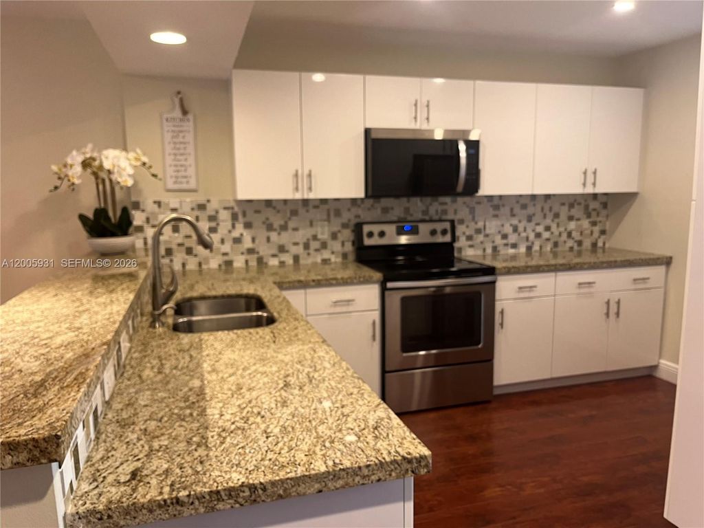 Photo of 201 Lakeview Drive #204, Weston, FL 33326 (MLS # A12005931)