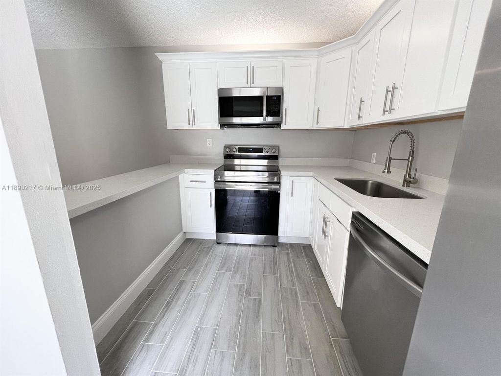 Photo of 1415 14th Ct, Palm Beach Gardens, FL 33410 (MLS # A11890217)