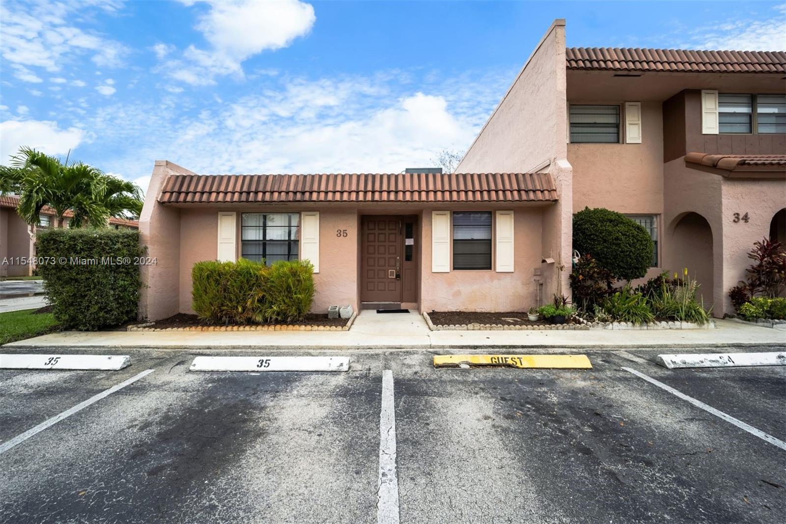 Welcome to 35 Cortez Way! Located in the quiet community of Valencia Village, this is a spacious 2BD/2BA featuring new appliances, new washer/dryer, wood floors, fresh paint throughout, and a screened back porch! The unit conveniently includes 2 assigned parking spaces and a guest space. Valencia Village features a swimming pool, green space, and an unbeatable location with everything you need right at your fingertips including Whole Foods, Trader Joes, Costco, and plenty of other retail and dining options nearby.