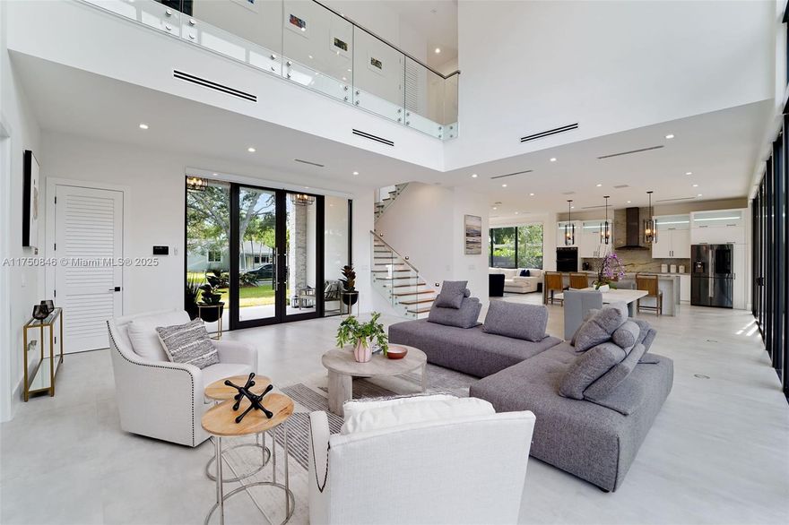 Discover unparalleled living in this newly built, modern pool home in Little Gables. Boasting a spacious open floor plan, this chic residence effortlessly transitions into a backyard entertainment oasis. Enjoy the fully equipped outdoor kitchen and BBQ area perfect for hosting. The dazzling pool with a shallow sun shelf, invites you to relax in style. This opulent home offers nearly 4,000 sqft of air-conditioned living space complemented by 1,023 sqft of covered terrace. Flooded with natural light from expansive windows, the home encompasses 4 bedrooms & 5 bathrooms. Spacious kitchen designed for entertaining boasts ample storage and island seating. This exquisite property is ready to welcome you!