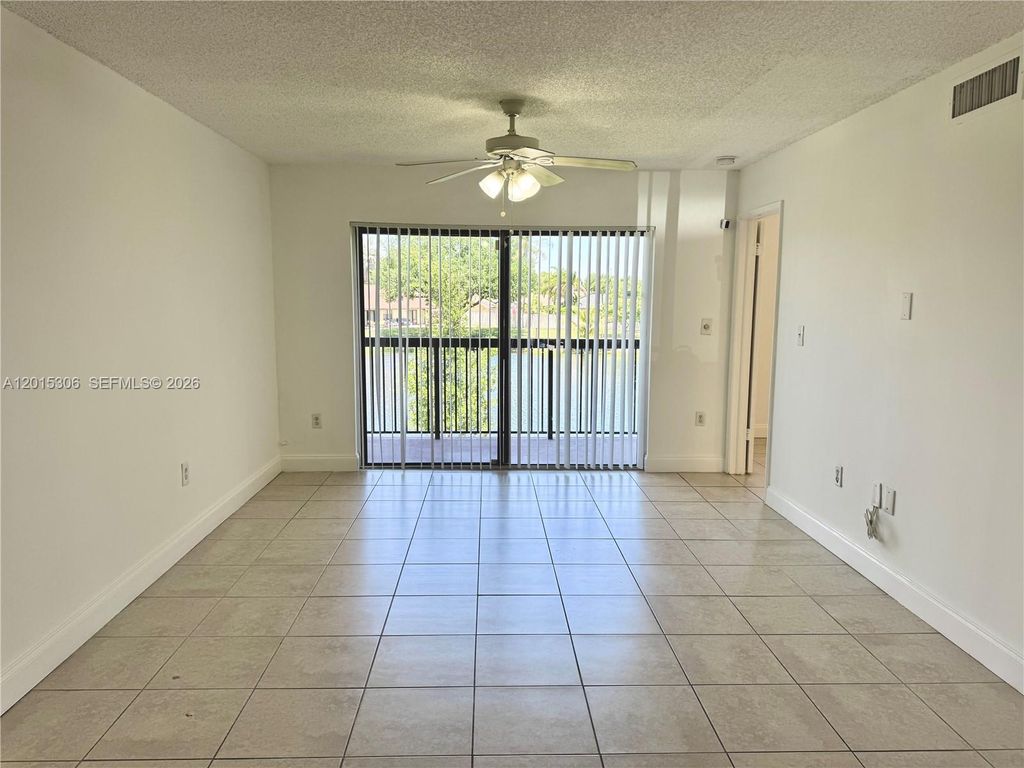 Photo of 9893 Nob Hill Ln #9893, Sunrise, FL 33351 (MLS # A12015306)