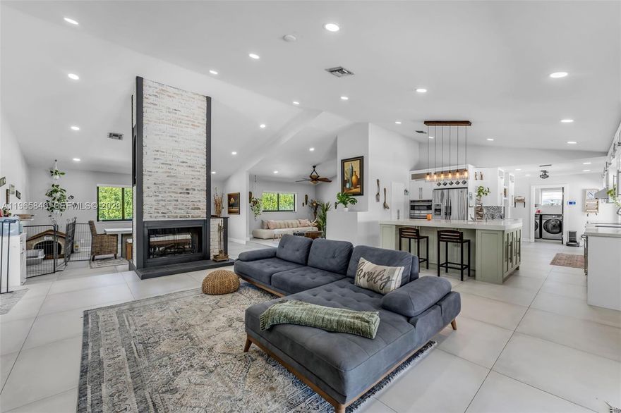 This private oasis offers the perfect blend of modern upgrades and serene outdoor living. Completely remodeled from 2021 onward, including a new roof (2021), impact windows and doors, remodeled kitchen and bathrooms, new interior doors, updated driveway, and more. Fully renovated corner estate on nearly an acre – No HOA, agricultural zoning! Situated on an expansive approximate 34,000 SF prime corner lot with dual gated entrances (one electric),The gourmet granite kitchen flows seamlessly into bright open living spaces with soaring vaulted ceilings and a cozy fireplace. Step outside to your resort-style backyard retreat: newly renovated pool (2024), tranquil koi pond with automatic cleaning system, zen garden, fruit trees (mango & avocado), sprinkler system, and a permitted barn structure. Property includes a private well water system plus septic—no HOA restrictions. Enjoy easy access to major roads for commuting, plus nearby wineries, championship golf courses, U-pick farms, family-friendly children’s play farms, and a variety of dining options. This rare corner gem offers unmatched privacy, space, and flexibility while still delivering curb appeal and functionality. Your peaceful sanctuary awaits!