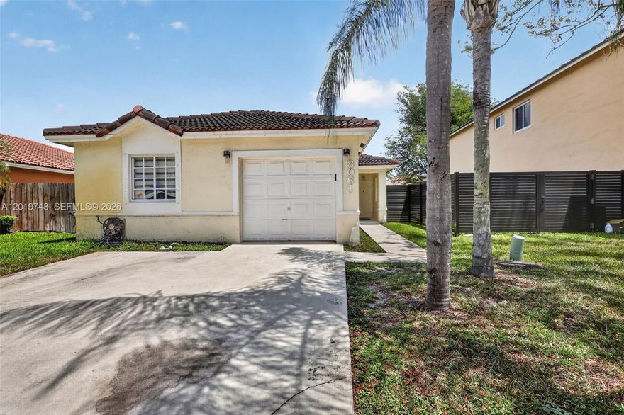 Beautifully updated home in a highly desirable neighborhood featuring an open floor plan and split-bedroom layout designed for both comfort and functionality. The remodeled kitchen and bathrooms showcase modern finishes, complemented by large 24-inch tile flooring and laminate throughout the home. The kitchen is equipped with Bosch and Frigidaire stainless steel appliances, perfect for everyday living and entertaining alike.

Step outside to enjoy the above-ground pool and inviting outdoor space ideal for gatherings with family and friends. Additional highlights include full hurricane protection, low HOA, and a brand-new barrel tile roof to be installed prior to closing for added peace of mind. Conveniently located near top-rated schools, shopping, major highways, and places of worship. Adorable and move-in ready — this home truly has it all. Call LA for easy access and showing instructions.