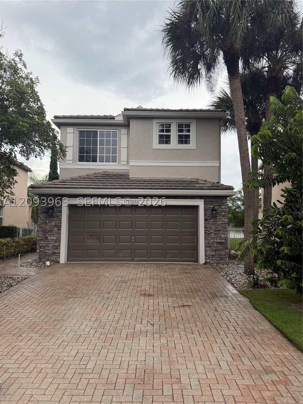Photo of 10355 Little Mustang Way, Lake Worth, FL 33449 (MLS # A12093963)