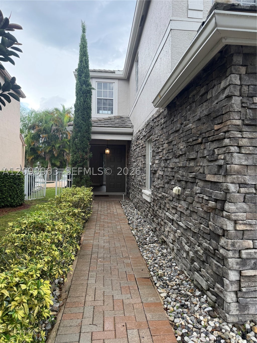 Photo of 10355 Little Mustang Way, Lake Worth, FL 33449 (MLS # A12093963)