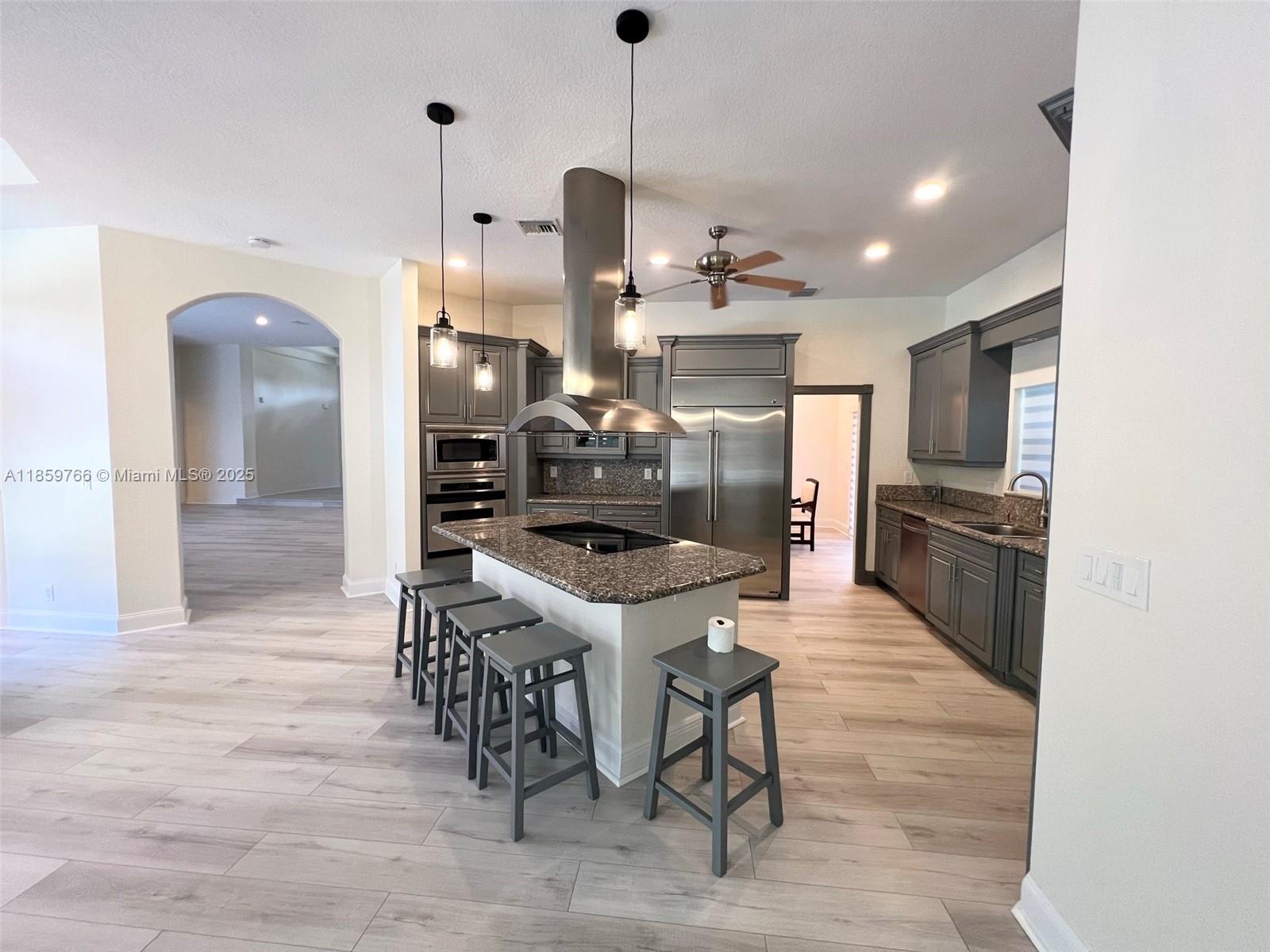 Newly remodeled home in luxurious man-gated community "Whispering Woods"! Oversized 1-acre lot. Impeccable condition. High ceiling. Gutted and remodeled bathrooms. Newer floors throughout. Freshly painted. Marble countertops in kitchen. Large laundry room. Master wing features a den, a walk-in closet, a spacious bathroom and a mirrored-vanity area. New roller shades in bedrooms and living area. Fences installed in backyard. Landscape is professionally maintained. 3-car garage. REQUIREMENTS: 600+ credit, income 2x rent, move-in cost is 3 months (1st month of rent + 2 months security deposit), pets OK $250 pet fees per pet (no dangerous breeds). 30 day move in process. Water is not included in the rent. Pool and landscape maintenance included.