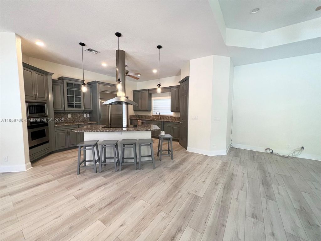 Photo of 8160 NW 47th Dr, Coral Springs, FL 33067 (MLS # A11859766)